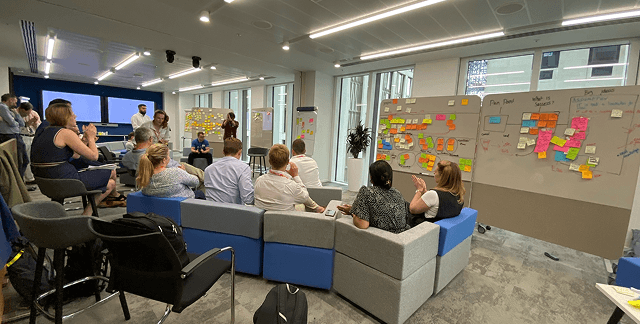 Service design workshop with military engineers around a whiteboard